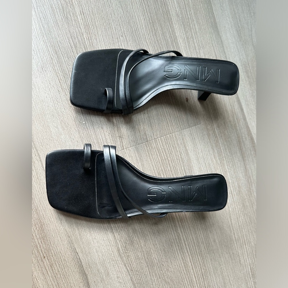 Heeled leather sandals with straps